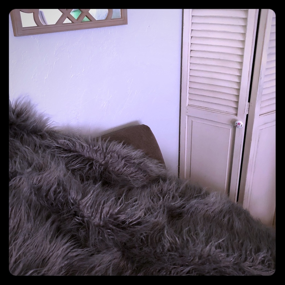 Faux fur throw in grey